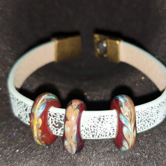 Bracelet with a magnetic clasp with a bead