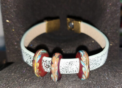 Bracelet with a magnetic clasp with a bead