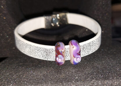 Bracelet with a magnetic clasp with a bead