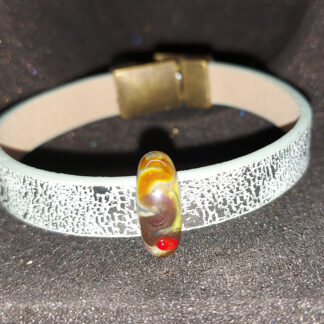 Bracelet with a magnetic clasp with a bead